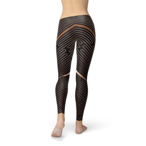 Back view of athletic striped line leggings for women in black with beige geometric stripes