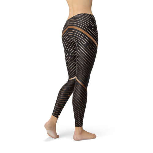 Black and brown athletic striped line leggings for women with unique line pattern on a female model